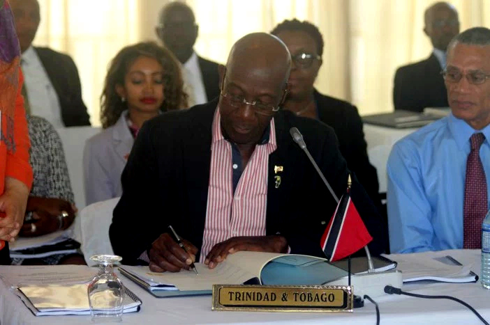 Prime Minister of Trinidad and Tobago Dr. Keith Rowley who has lead responsibility for Security in the CARICOM Heads of Government quasi-Cabinet is the first to sign a protocol amending the Revised Treaty of Chaguaramas to formally establish the Coun