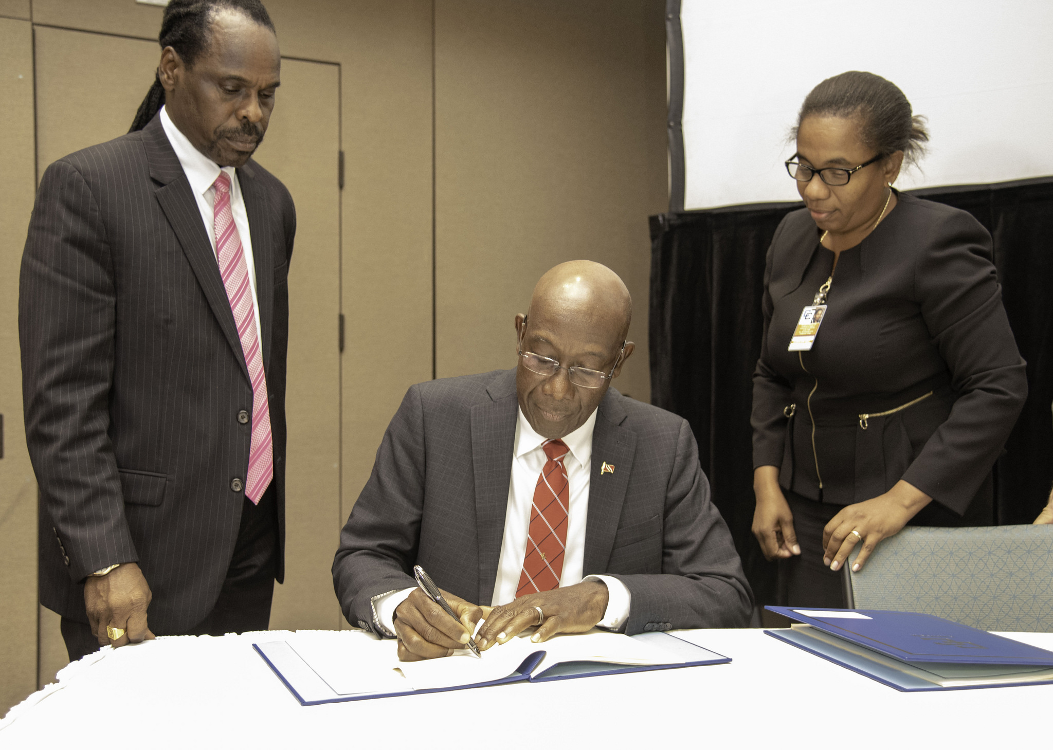 Prime Minister Rowley signs agreements