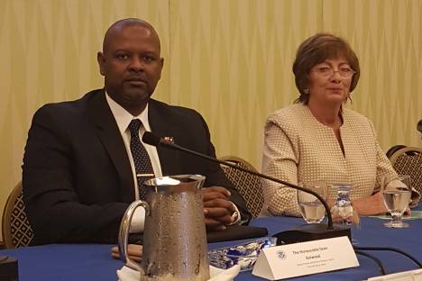 Ministry of Border Control and Employment, Sean Astwood (L), and US Ambassador to Barbados, the Eastern Caribbean and the OECS, Linda Taglialetela