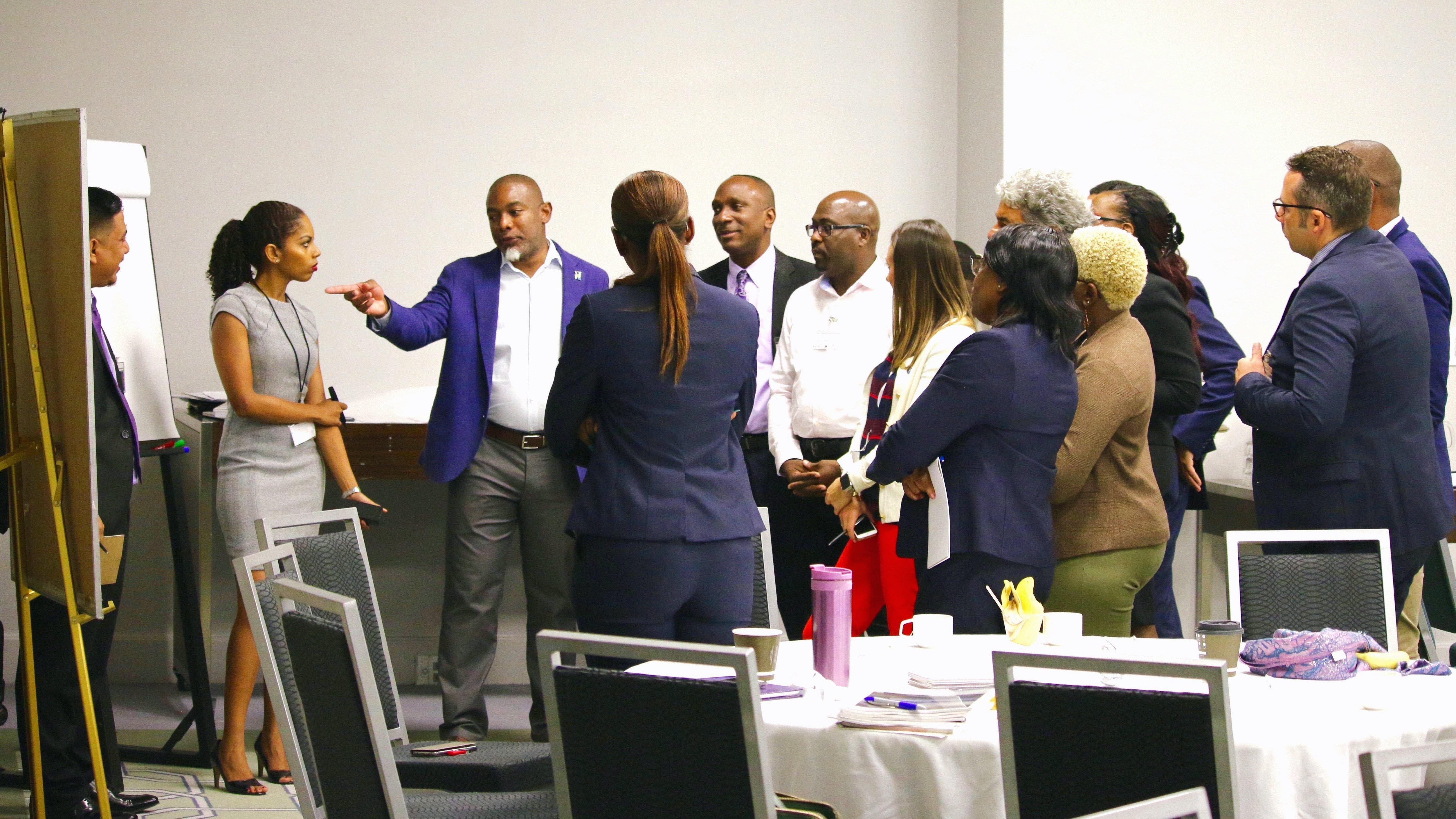 Dr. Devon Gardner articulates point during group activity on priorities for the Caribbean Energy Knowledge Hub