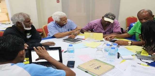 CNFO representatives from Belize, Suriname and Trinidad and Tobago share their ideas during a working-group session to develop priority areas for an action plan. (Photo via St. Lucia News Online)