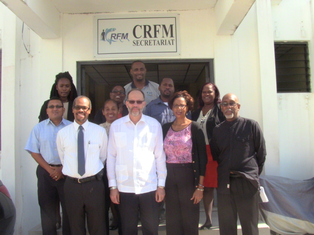 CARICOM Secretary-General Ambassador Irwin LaRocque (centre-front) , Executive Director of the Caribbean Regional Fisheries Mechanism, CRFM, Mr. Milton Haughton (front-left), share photo with CARICOM Secretariat and CRFM staff