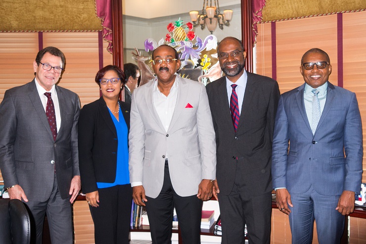 Antigua and Barbuda’s Prime Minister Gaston Browne (centre), stands with (left to right): Dr Warren Smith, President of the Caribbean Development Bank; Onika Miller, Executive, Government Relations and Public Policy, Jamaica National Building S