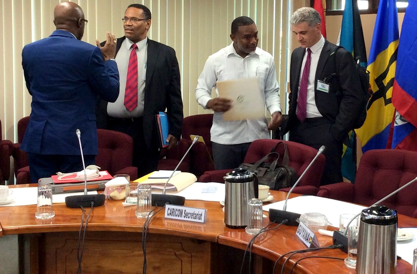 After the Round Table Discussion, from left, Rear Admiral Gary Best, CARICOM ASG Joseph Cox, CARICOM Energy Programme Manager, Dr. Devon Gardner and Dr. Thackwray Driver