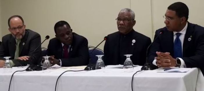 Prime Minister of Grenada, Dr. the Rt. Hon. Keith Mitchell (second from left) announcing the approval of the ICT Integrated Work Plan and Budget. Also in photograph are, from left, CARICOM Secretary-General, Ambassador Irwin LaRocque, President of Gu