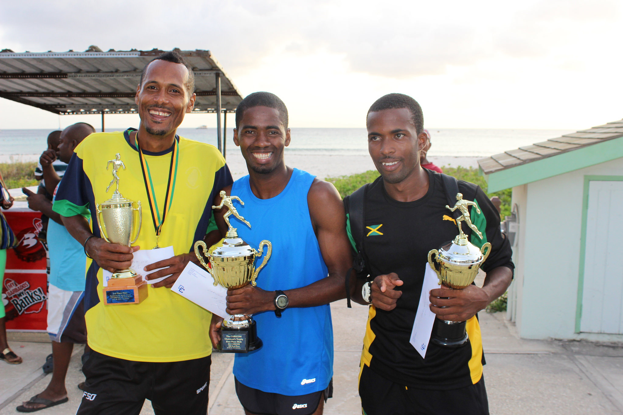 Top three men - (l-r) Pamenos Ballantyne (SVG) 3rd; Cleveland Forde (Guyana) 1st; and Kirk Browne (Jamaica) 2nd