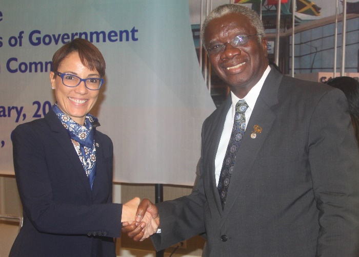 Prime Minister Freundel Stuart of Barbados; and the Minister of Foreign Affairs and Foreign Trade of Jamaica, Senator Kamina Johnson Smith, participating in a photo opportunity following their ratification of protocols on behalf of their respective c