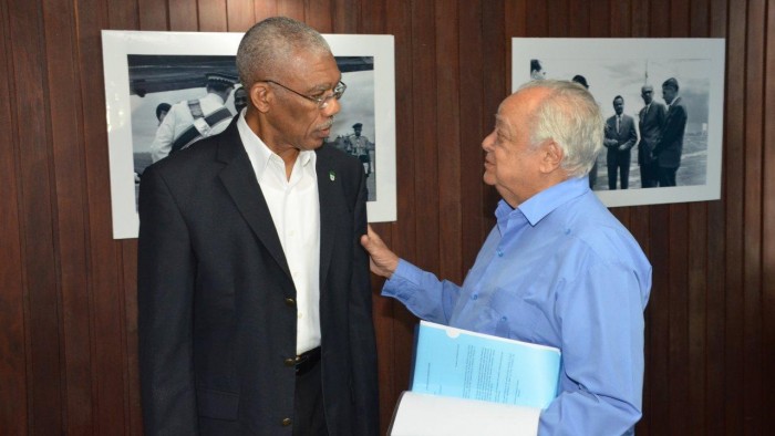 President David Granger and Sir Shridath Ramphal share a light moment, during yesterday's meeting.