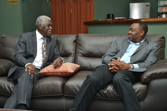 olonel, Egbert Field [left] and President of the International Civil Aviation Organisation (ICAO), Dr. Olumuyiwa Benard Aliu in discussion at the Roraima Longe at CJIA. (Photo via DPI)