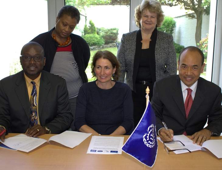Signing the Memorandum of Agreement on legislative agenda at ILO Brussels office, from left, David Massiah, Paula Robinson, Claire Courteille, Anne Knowles and Wayne Chen.