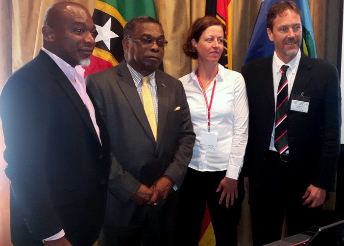 Dr. Gardener (left) and Minister Liburd (2nd from left) and officials from GIZ (Photo via St Kitts and Nevis Information Service)