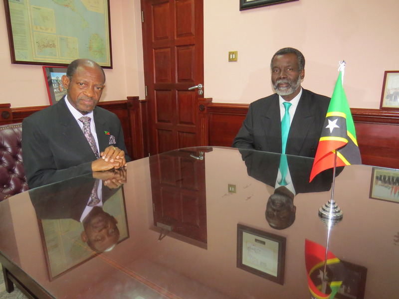 St. Kitts and Nevis’ Prime Minister the Right Hon. Dr. Denzil L. Douglas (left) and outgoing OAS Director to St. Kitts and Nevis, Mr. Starret Greene. (Photo by Erasmus Williams)