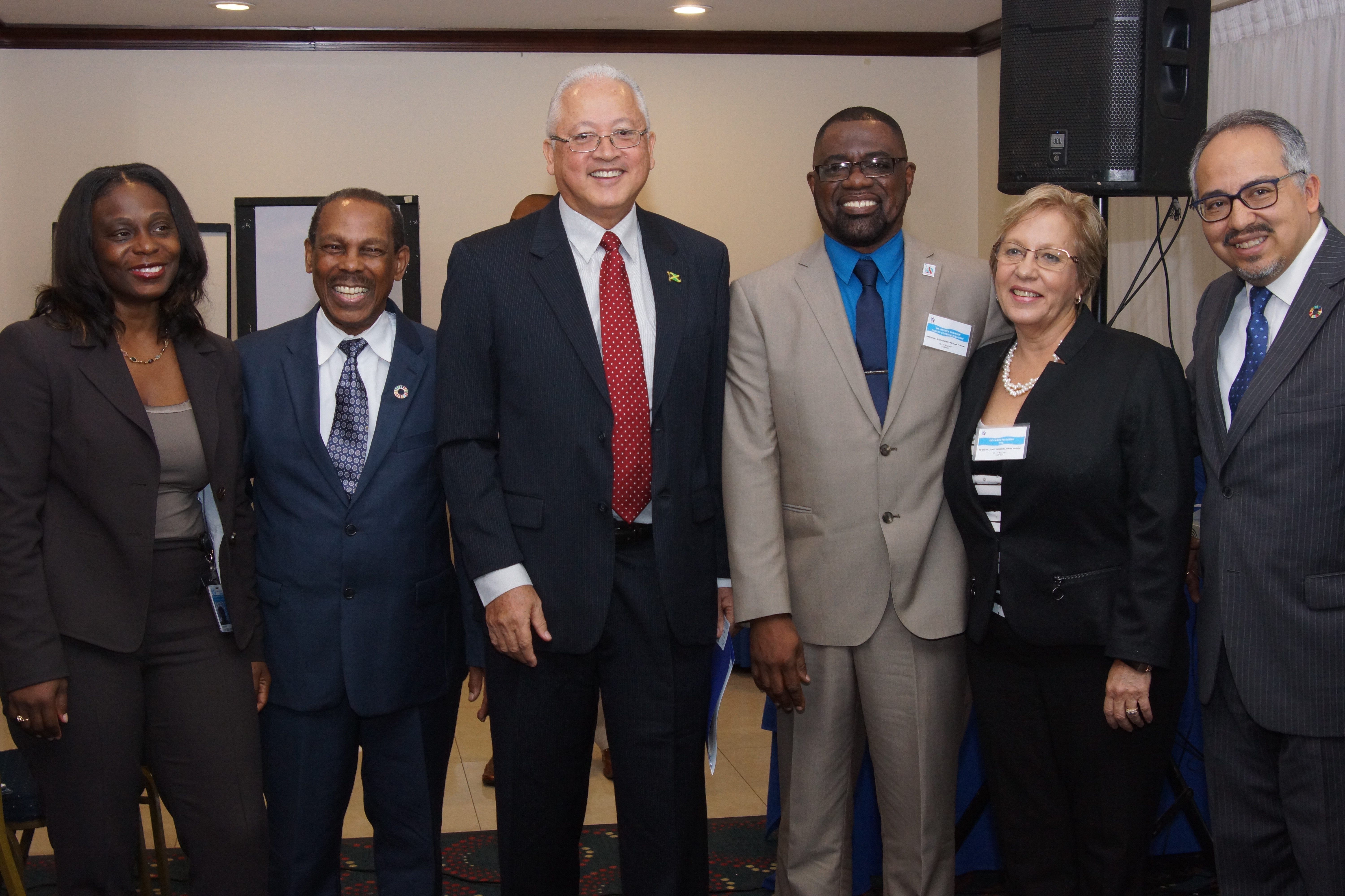 (L-R) Dr Elsie Laurence-Chounoune, Deputy Resident Representative of the United Nations Development Programme (UNDP) in Jamaica, Dr John Edward Greene, UN Secretary-General Special Envoy for HIV and AIDS in the Caribbean, Hon. Delroy Chuck, Minister