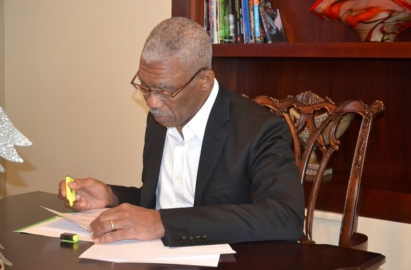 President Granger preparing for Commonwealth Heads of Government meeting while in transit in Trinidad and Tobago (Photo via Ministry of the Presidency)
