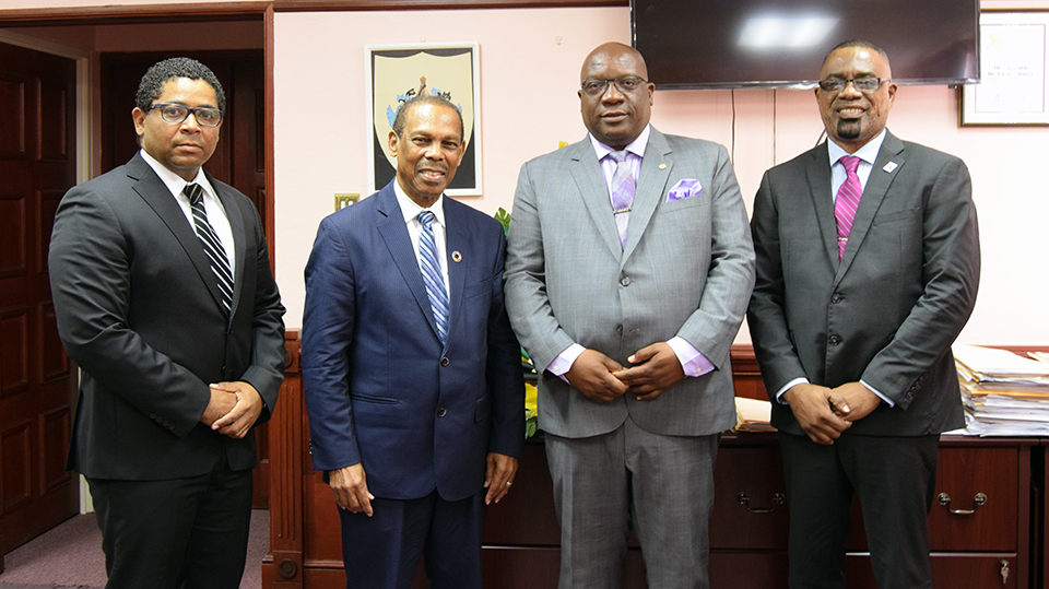 Photo caption (left to right): Special Advisor to the Prime Minister, Mr. Andrew Skerritt; UN Secretary-General Special Envoy for HIV in the Caribbean, Dr. Edward Greene; Prime Minister Dr. the Hon. Timothy Harris; Director of PANCAP's Coordinat