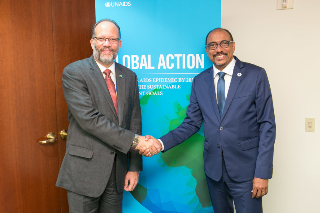 CARICOM Secretary-General Ambassador Irwin LaRocque (left) and UNAIDS Executive Director, Michel Sidibe