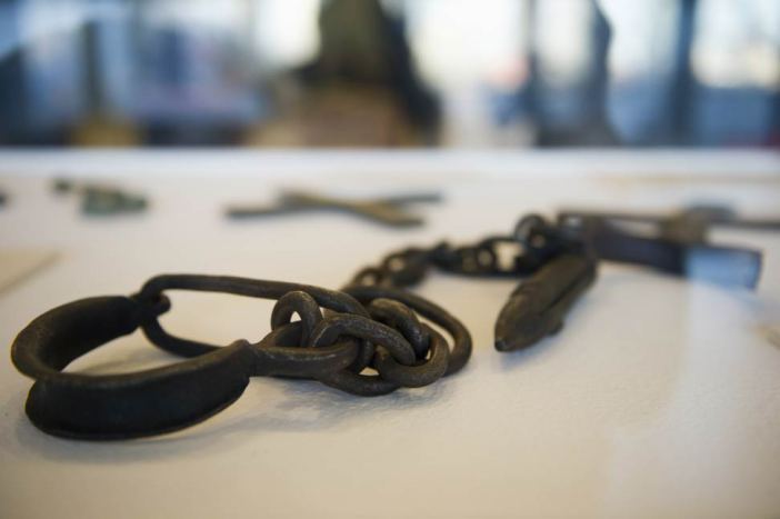 Shackles used to bind slaves. (Photo via UN/Mark Garten)