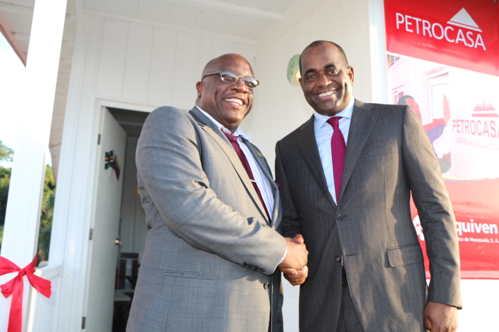 St. Kitts-Nevis Prime Minister Dr. Hon. Timothy Harris (left) greets Dominica’s Prime Minister Hon. Roosevelt Skerrit.