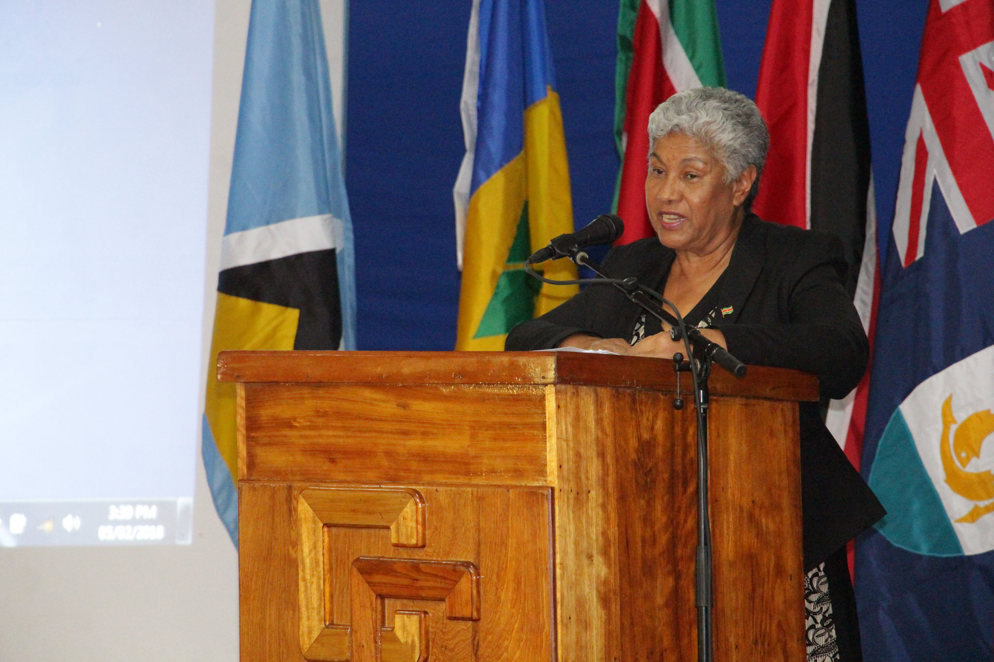 Chairman of the Council on Human and Social Development (COHSOD) and Minister of Education, Science and Culture of Suriname, the Hon. Lilian Ferrier speaking at the opening ceremony of the Thirty-Fourth COHSOD at the Theatre Guild Playhouse in George