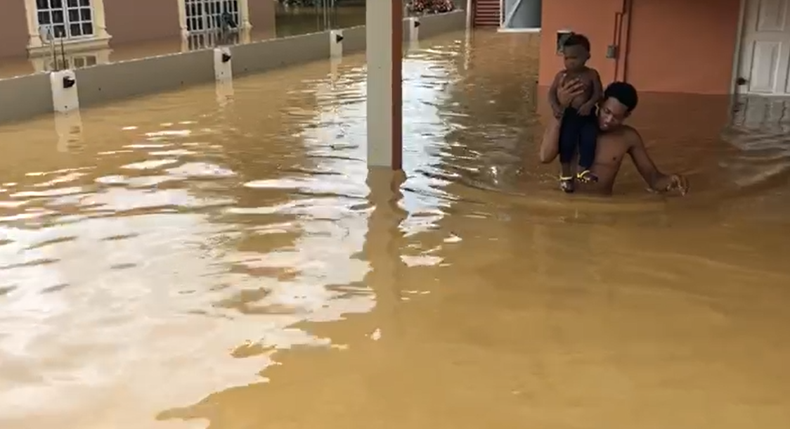 Water in some areas in Trinidad and Tobago was waist high (Photo via CNC3)