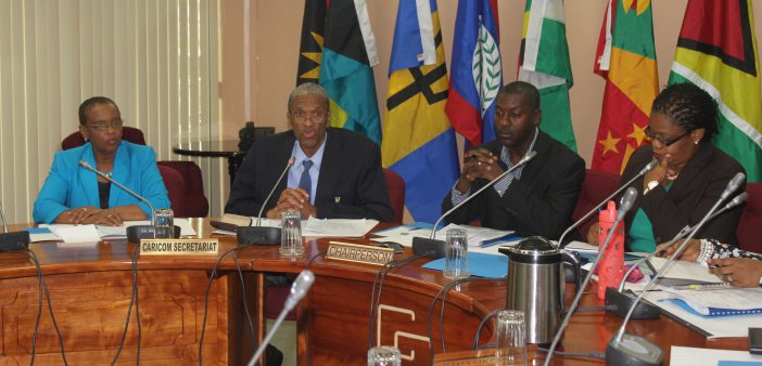 Assistant Secretary General, Human and Social Development at the CARICOM Secretariat Dr. Douglas Slater (second left) makes remarks during the Eighth Meeting of Directors of Youth Affairs. Also pictured are, from left, Director Human Development at C