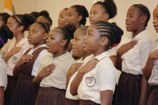 Students of the James Garbutt SDA School Choir perform the National Anthem during the launch of Phase Two of the Belize Education Sector Reform Programme in Belize City on January 27, 2016. (Photo via CDB)