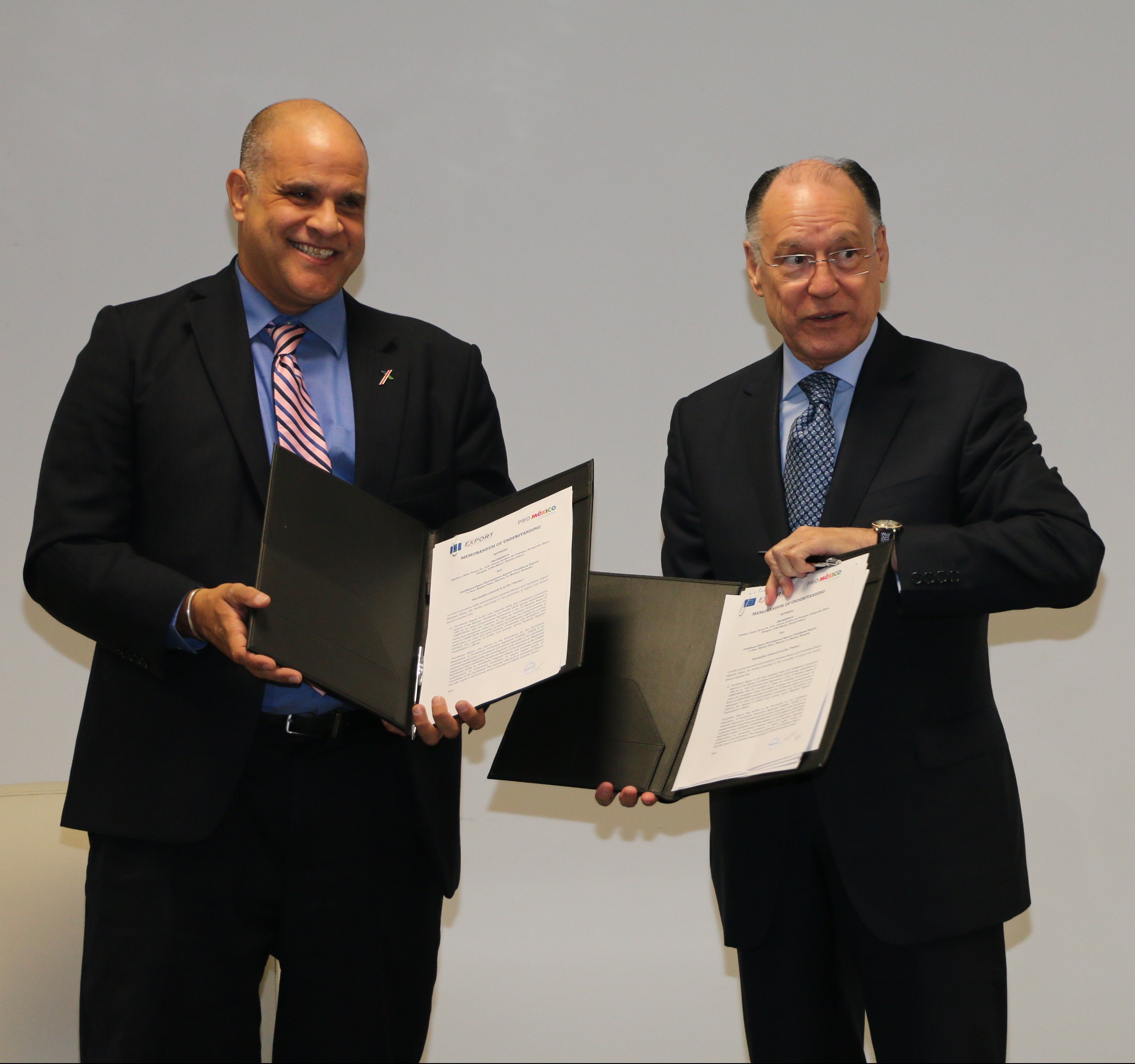 Mr. Escipion Oliveira, Deputy Executive Director, Caribbean Export (left) and Mr. Jesús Mario Chacón, Chief of the International Business and Investment Promotion Unit, ProMexico (right)