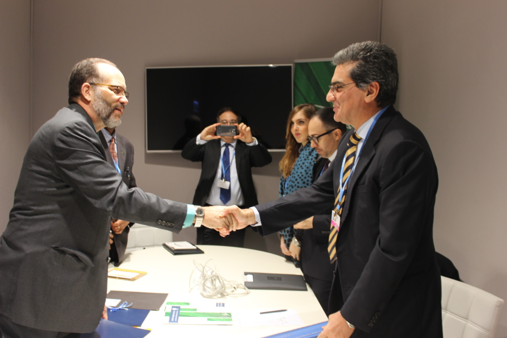 CARICOM Secretary-General Ambassador Irwin LaRocque (l) shakes hands with Italian Special Envoy for the Countries of the Caribbean Paolo Serpi