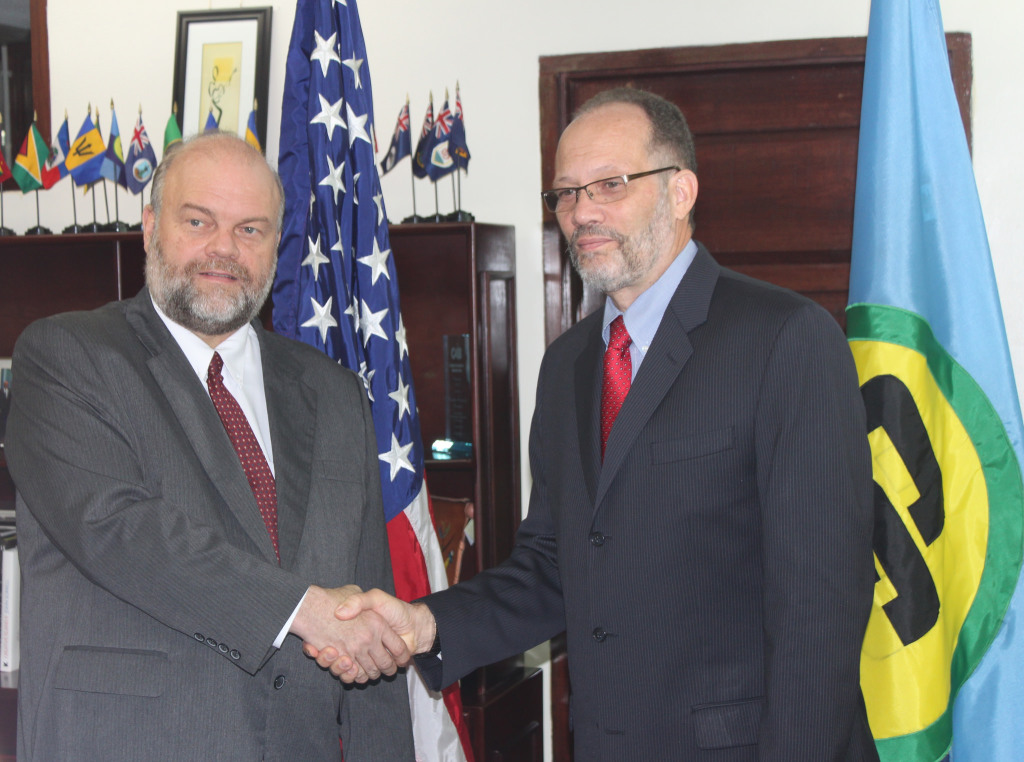 CARICOM Secretary-General Ambassador Irwin LaRocque welcomes new United States Ambassador to CARICOM H.E. Perry Holloway at the CARICOM Secretariat Headquarters, Georgetown, Guyana, Tuesday.