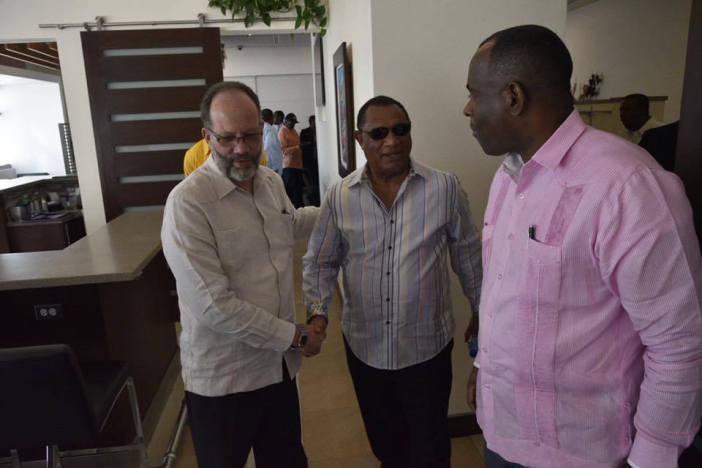 Prime Minister of The Bahamas Hon. Perry Christie greets CARICOM Secretary-General Ambassador Irwin LaRocque while CARICOM Chairman, Prime Minister Roosevelt Skerrit of Dominica looks on (Photo via Dominica PM&rsquo;s Office)