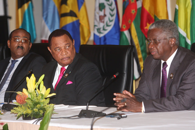 Prime Minister of Barbados Rt. Hon. Freundel Stuart (r) makes a point to the media as CARICOM Chairman and Prime Minister of The Bahamas Rt. Hon. Perry Christie (c) and Prime Minister of Antigua and Barbuda Hon. Gaston Browne look on.