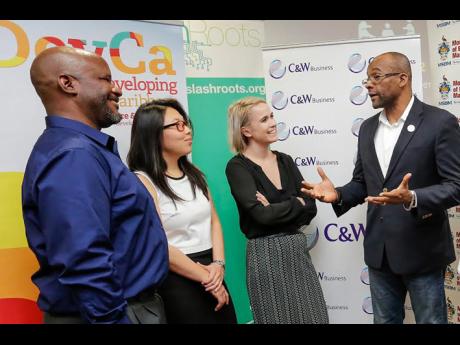 From left: Dr Maurice McNaughton, director of the Centre of Excellence for IT-enabled Innovation at the Mona School of Business and Management; Laura Manley, co-founder for the US-based Centre for Open Data Enterprise; Katelyn Rodgers, project manage