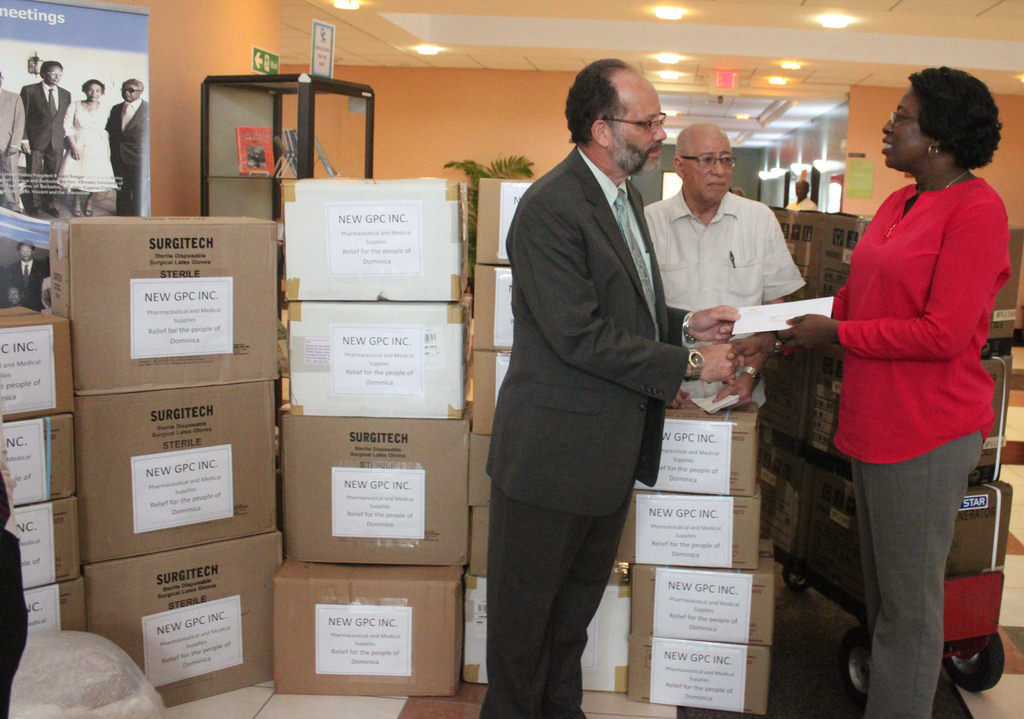CARICOM SG, Amb. LaRocque receives donations from the Managing Director of the Demerara Tobacco Company Ltd, Guyana, on behalf of the people of Dominica.