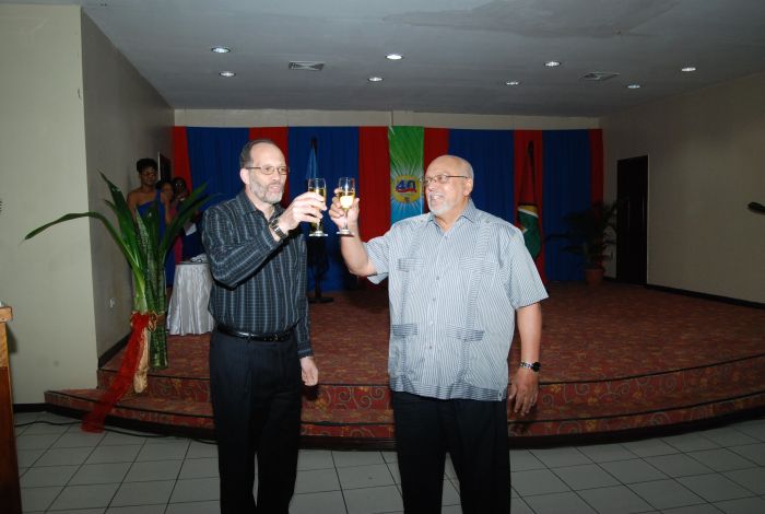 His Excellency Donald Ramotar, President of Guyana and Ambassador Irwin LaRocque, Secretary-General raise a toast to the Community, Guyana and the staff of the Secretariat at an end of year function and Staff Recognition Awards ceremony on Friday nig