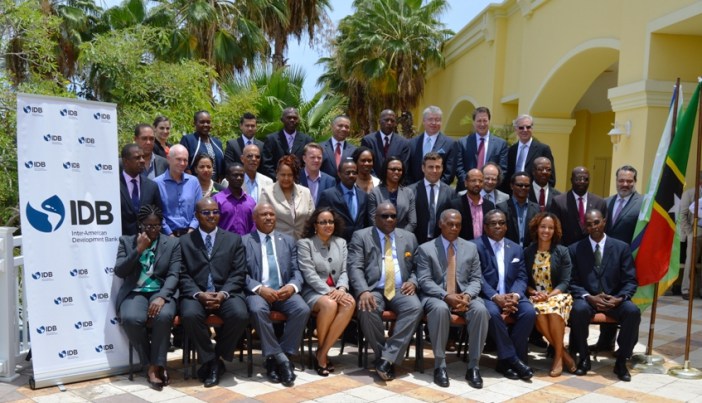 Prime Minister Dr. Timothy Harris (seated 5th from right), Members of the Federal Cabinet, OECS and CARICOM Officials and OECS Ministers of Energy. (Photo via SKNIS)