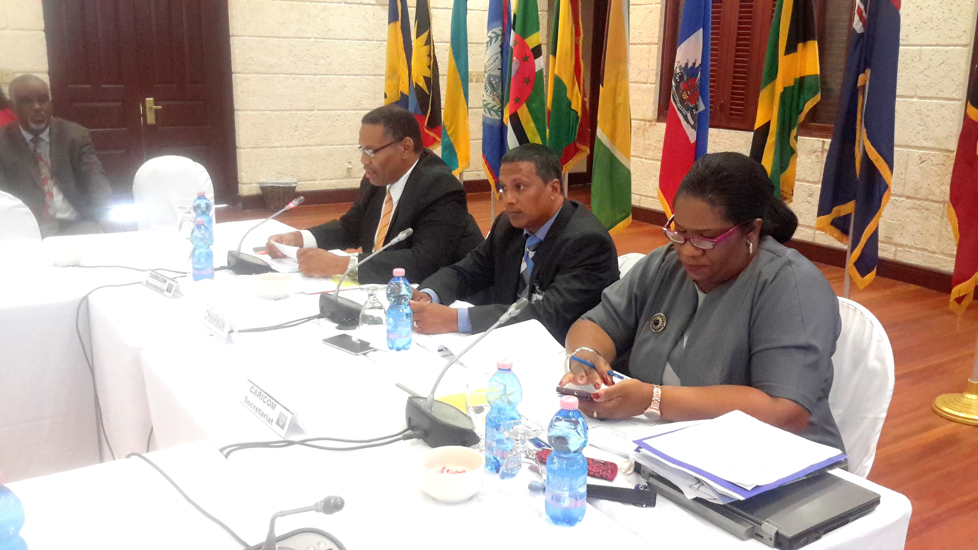 From left, ASG, Trade and Economic Integration, Mr. Joseph Cox, Chair of the Meeting, Minister Guy Joseph and Deputy Programme Manager, ICT4D, CARICOM Secretariat, Ms. Jennifer Britton