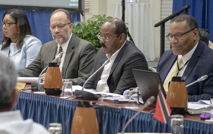 Chairman of the Meeting, Prime Minister and Minister of Finance of Antigua and Barbuda, Gaston Browne (2nd right) addresses the meeting, with CARICOM Secretary-General Ambassador Irwin LaRocque (3rd right); Assistant Secretary-General Joseph Cox (rig