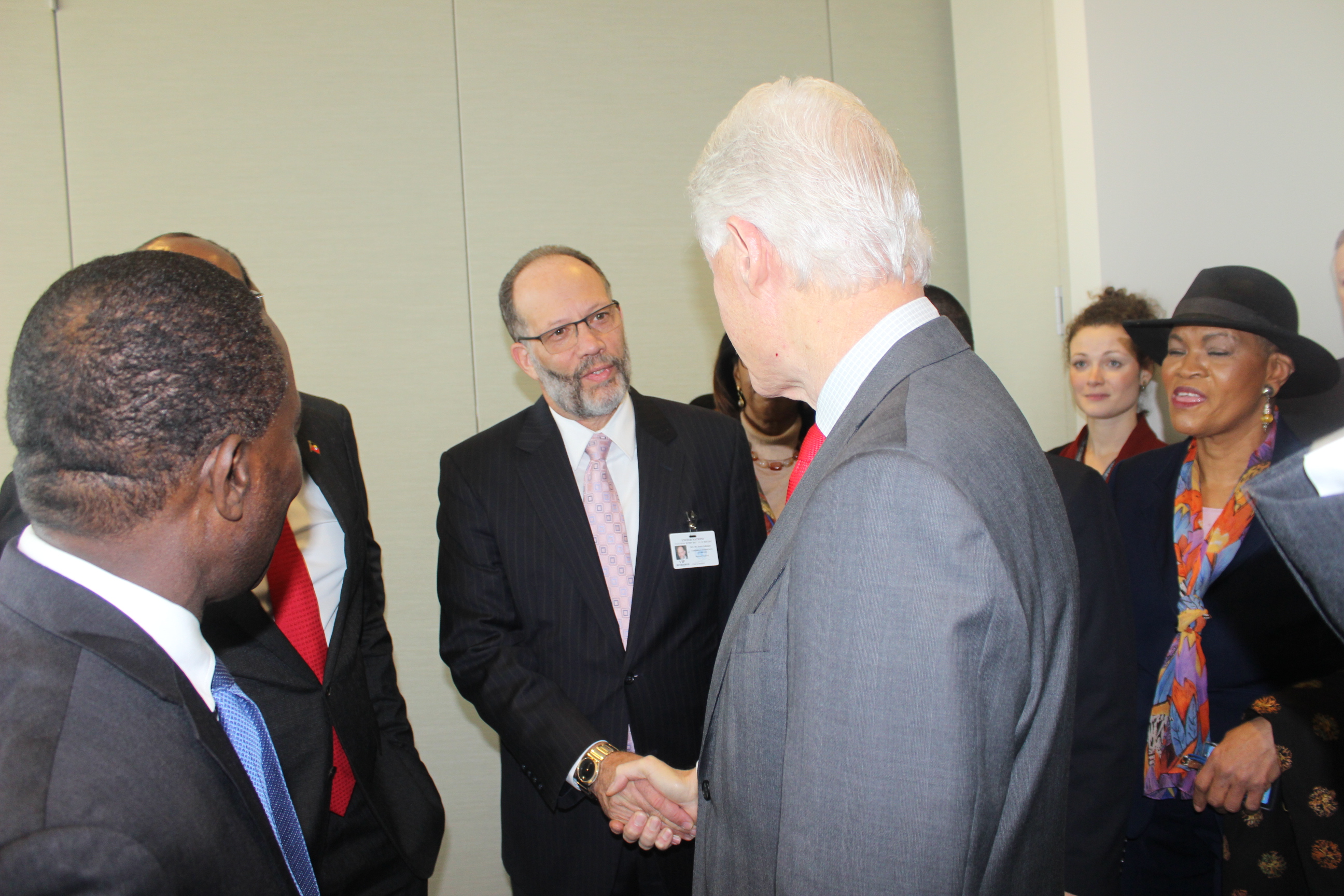 CARICOM SG Amb. Irwin LaRocque greets former US President Bill Clinton