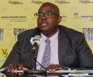 Executive Director of the Jamaica Anti-Doping Commission (JADCO), Carey Brown, addresses a JIS Think Tank, at the agency&rsquo;s head office in Kingston. Photo Courtesy JIS.