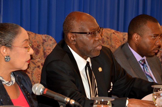 Minister of Health, Dr. Fenton Ferguson (centre), addresses a press briefing held at Jamaica House on Monday, February 16, to announce Government&rsquo;s allocation of $54.4 million for a Measles Prevention Campaign, which will run from February 16 t