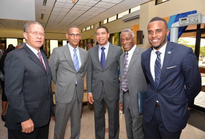 Prime Minister Andrew Holness (centre) is seen with (from left): Mr Bruce Golding, former Prime Minister and newly appointed Chairman of CARICOM Review Commission, Damien King, Economist, Professor Alvin Wint, and Andre Mariott-Blake, CARICOM Youth A