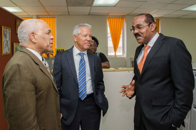 Minister of Transport, Works and Housing, Dr. the Hon. Omar Davies (left), having a light discussion with Prime Minister of Antigua and Barbuda, Hon. Gaston Browne (right) and Director General of the Maritime Authority of Jamaica, Rear Admiral Peter