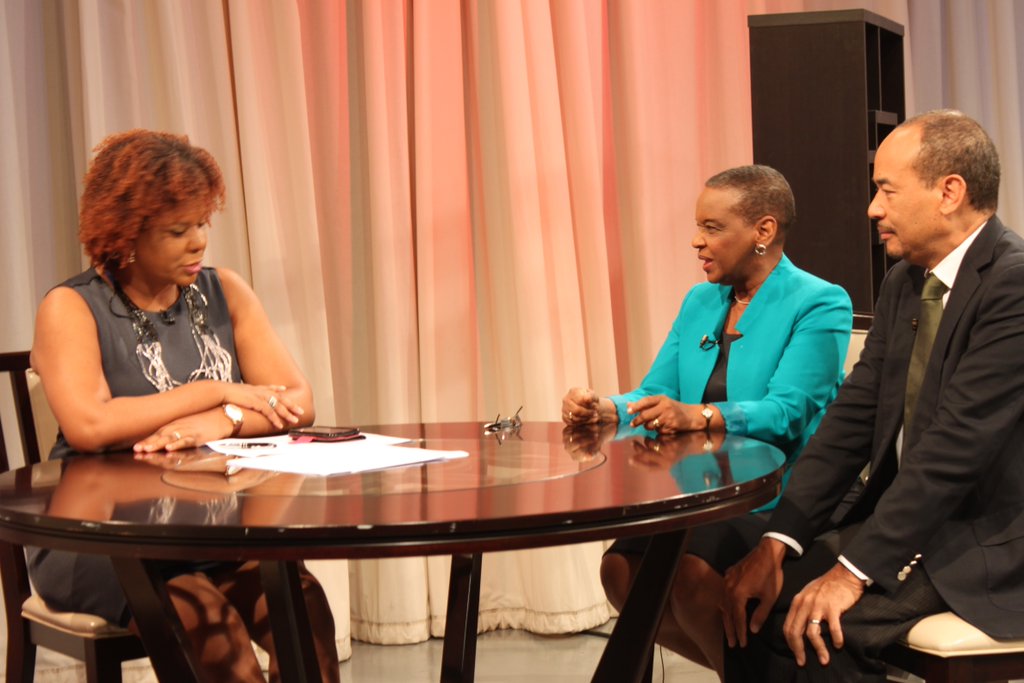 Ms. Myrna Bernard of the CARICOM Secretariat (centre) and Member of the CARICOM HRD Commission, Mr. Wayne Chen, chat with programme host Ms. Cassandra Crawford