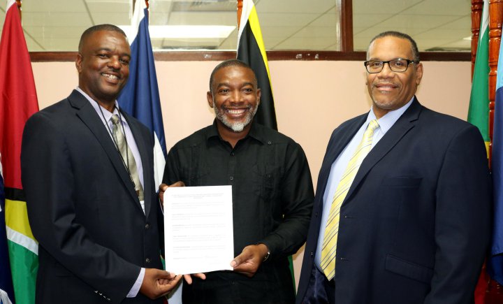 From left, the Hon. Paul Lewis, Minister of Communications, Works and Labour, Montserrat; Dr. Devon Gardner, Programme Manager, Energy, CARICOM Secretariat; and Mr. Joseph Cox, Assistant Secretary-General, Trade and Economic Integration, CARICOM Secr