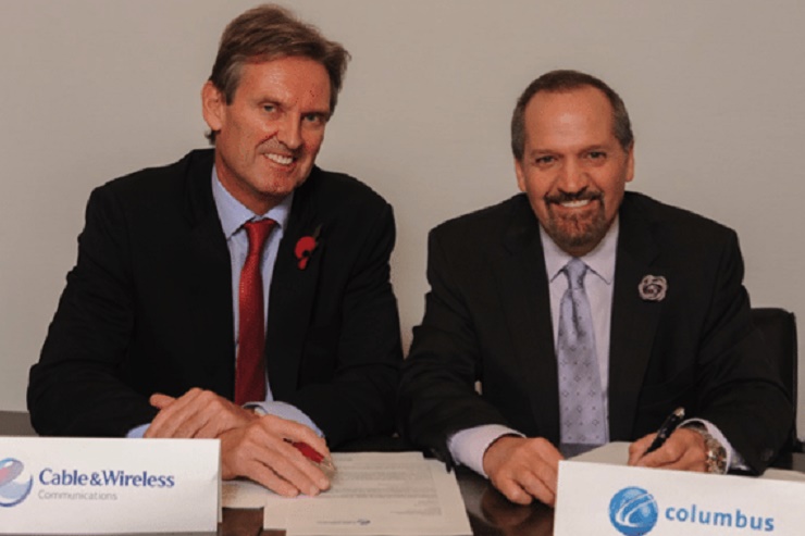 FLASHBACK: Phil Bentley, the then chief executive officer of Cable and Wireless Communications (left) and Brendan Paddick, CEO and chairman of Columbus Communications after signing the proposed merger agreement back in November 2014. (Photo credit ca