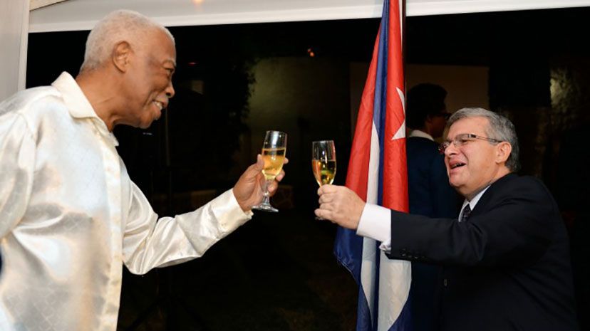 Minister of Foreign Affairs and Foreign Trade, Senator the Hon. A. J. Nicholson (right), raises a toast to Cuba&amp;rsquo;s Ambassador to Jamaica, His Excellency Bernardo Guanche Hernandez (left), at a reception held at the Ambassador&amp;rsquo;s res