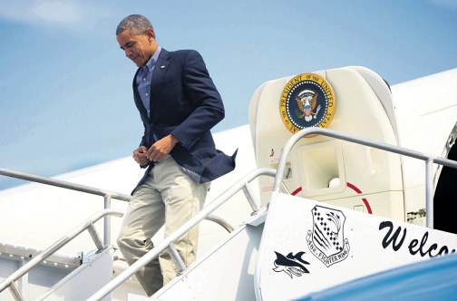 US President Barack Obama alighting Air Force One at St Lucie International Airport on Saturday, March 28, 2015, in Fort Pierce, Florida. (PHOTO: AP)