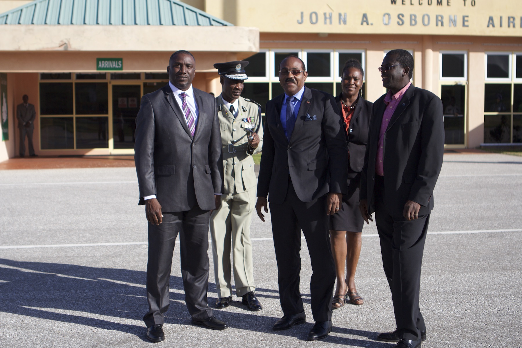 PM Browne meeting Premier Romeo at the John Osborne Airport in Montserrat