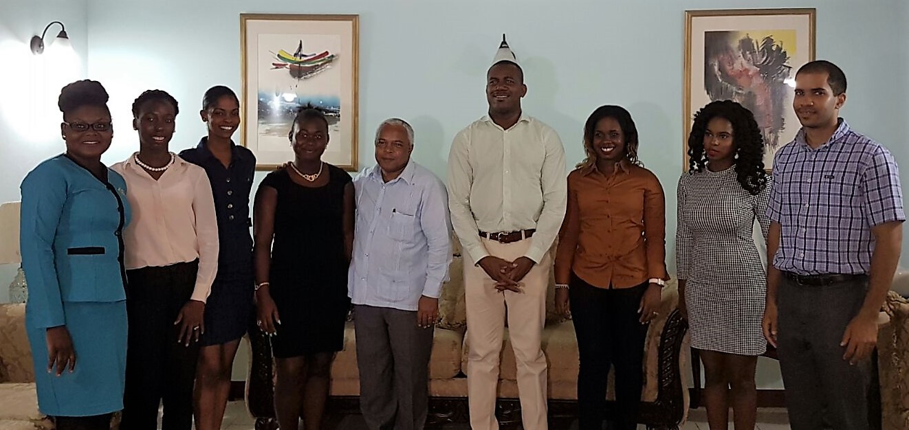 (L-R): Monique Harry; Ava Spencer-Crawford; Carrie Bussue; Jeffvancia Matthew, H.E. Ambassador Hugo Ruiz Cabrera; Honourable Shawn Richards; Simoneth Williams; Tishima Browne; Andre Hanley
