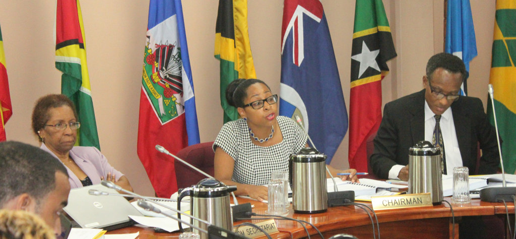 Ms. Desiree Field-Ridley, Officer-in-Charge, Trade and Economic Integration Directorate, CARICOM Secretariat, and Mr. Timothy Odle, Deputy Programme Manager, Services, flank Ms. Valique Gomes, Permanent Secretary (ag), Ministry of Economy and Trade,